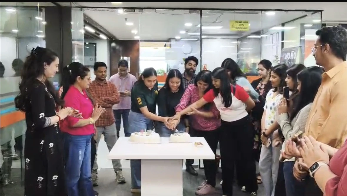 Cake, candles, colleagues